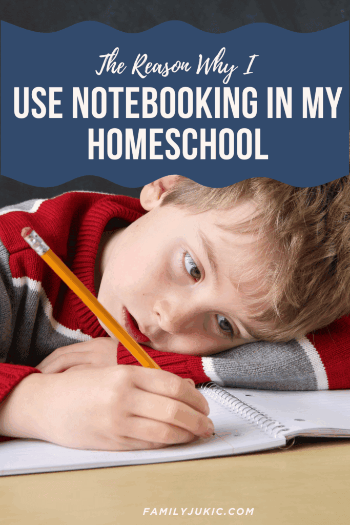 boy writing in a notebook